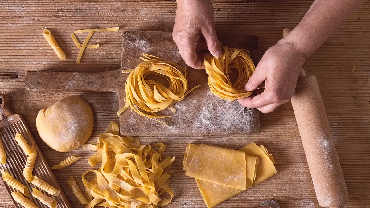 Fresh pasta on a floured board
