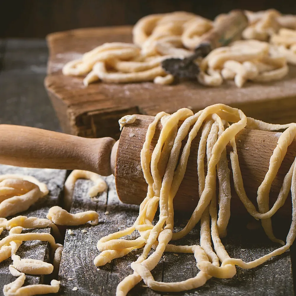 Hand-rolled pasta and rolling pin